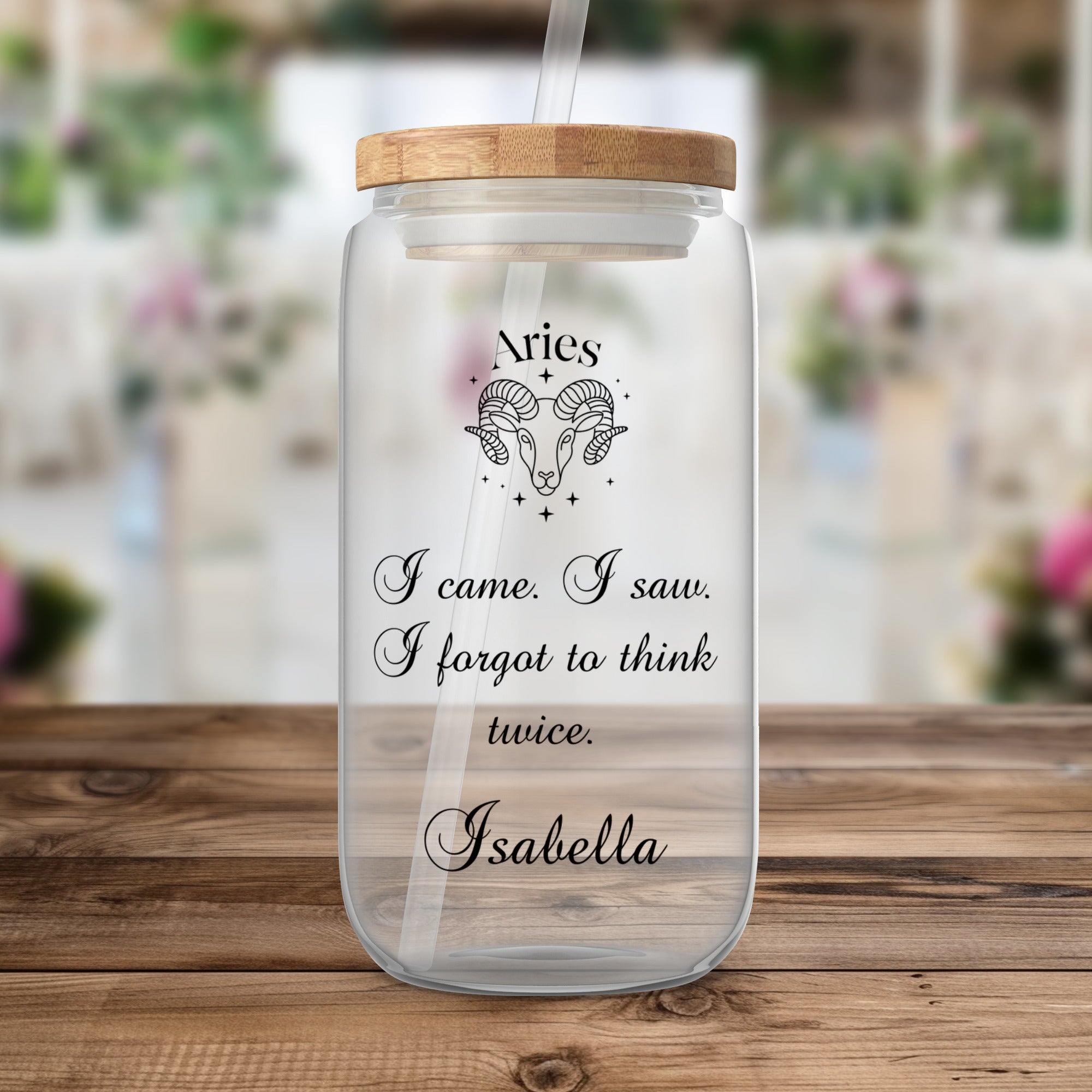 Glass tumbler with Aries constellation, zodiac quote, and name Isabella.