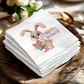Stack of napkins featuring a cartoon bunny holding a birthday gift and "Hoppy Birthday!" text.