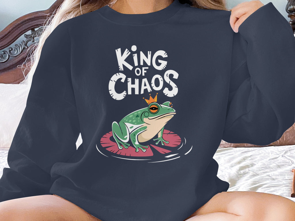 Frog wearing crown on lily pad, "King of Chaos" text above.