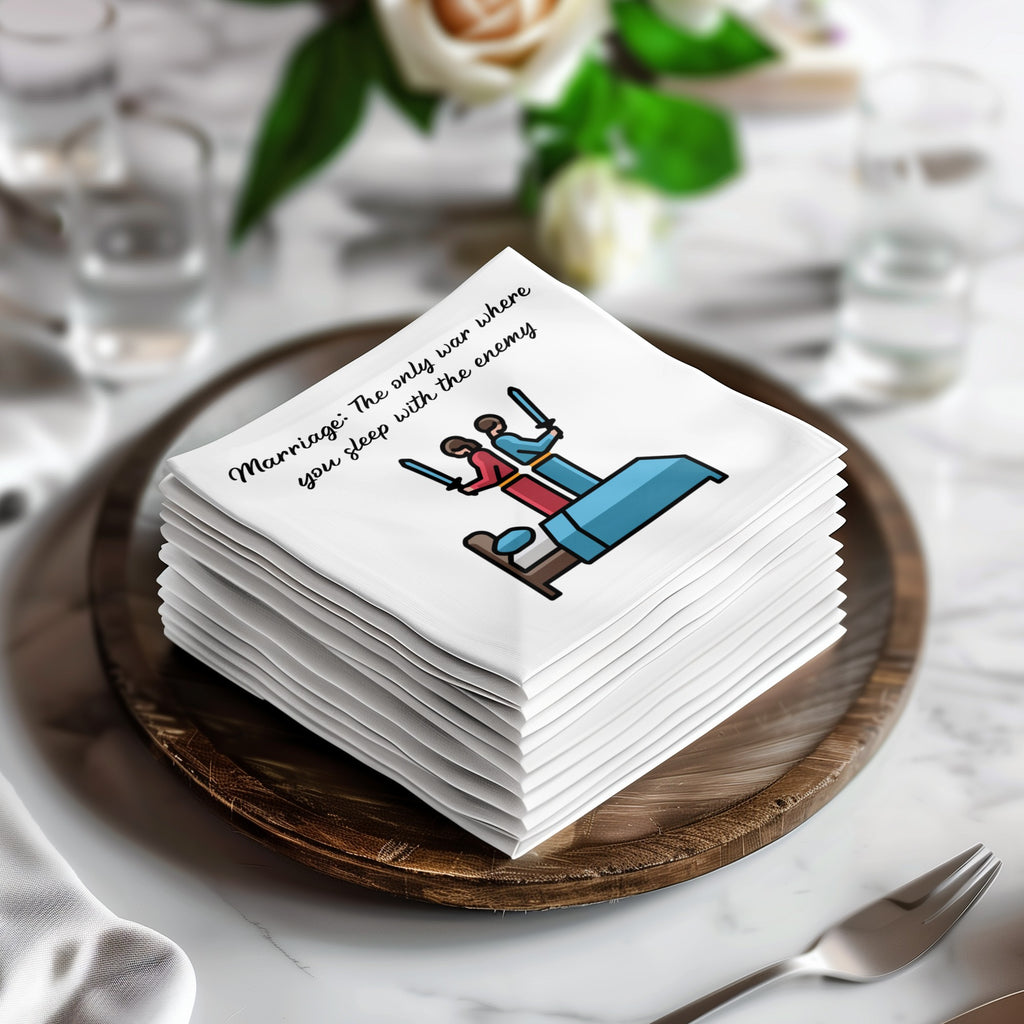 Stack of napkins with cartoon figures and text "Marriage: The only war where you sleep with the enemy".