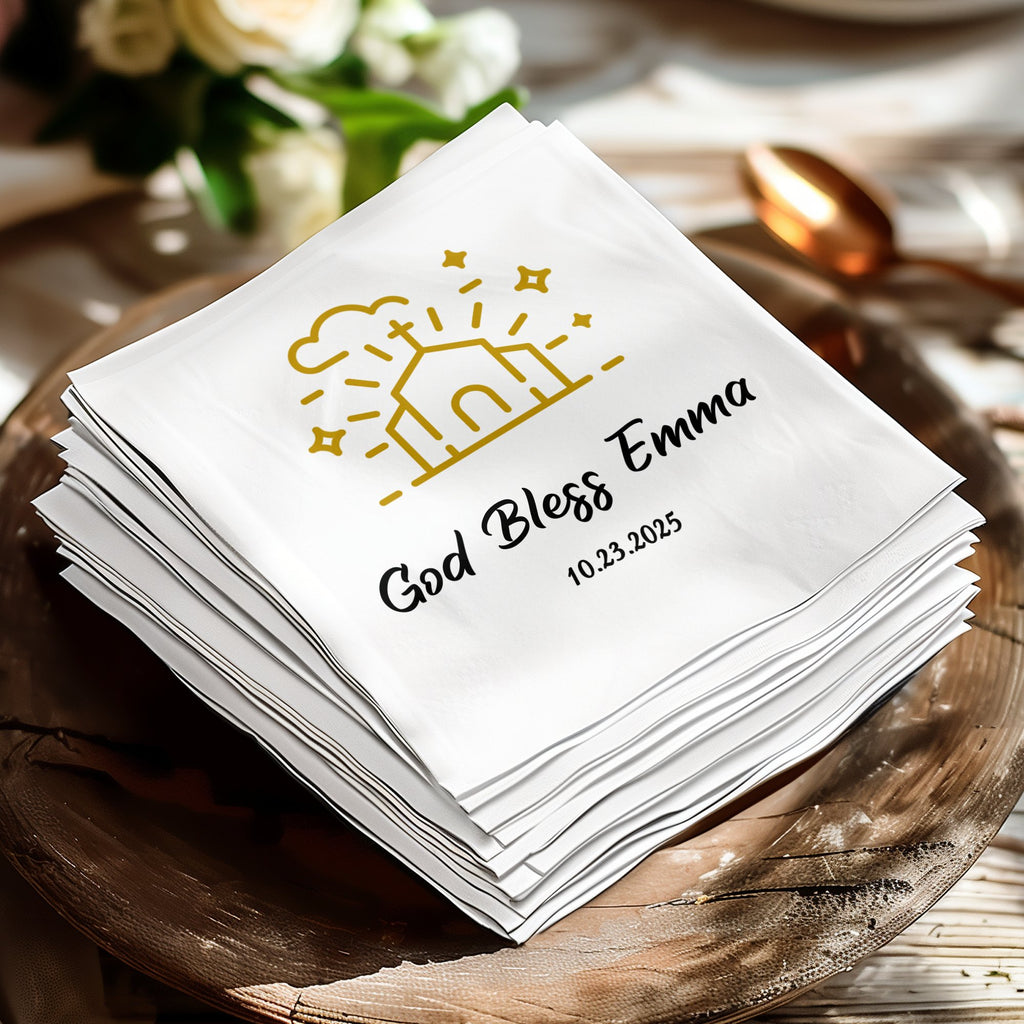 Napkins with "God Bless Emma" and "10.23.2025" text, wedding or religious theme.