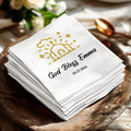 Napkins with "God Bless Emma" and "10.23.2025" text, wedding or religious theme.