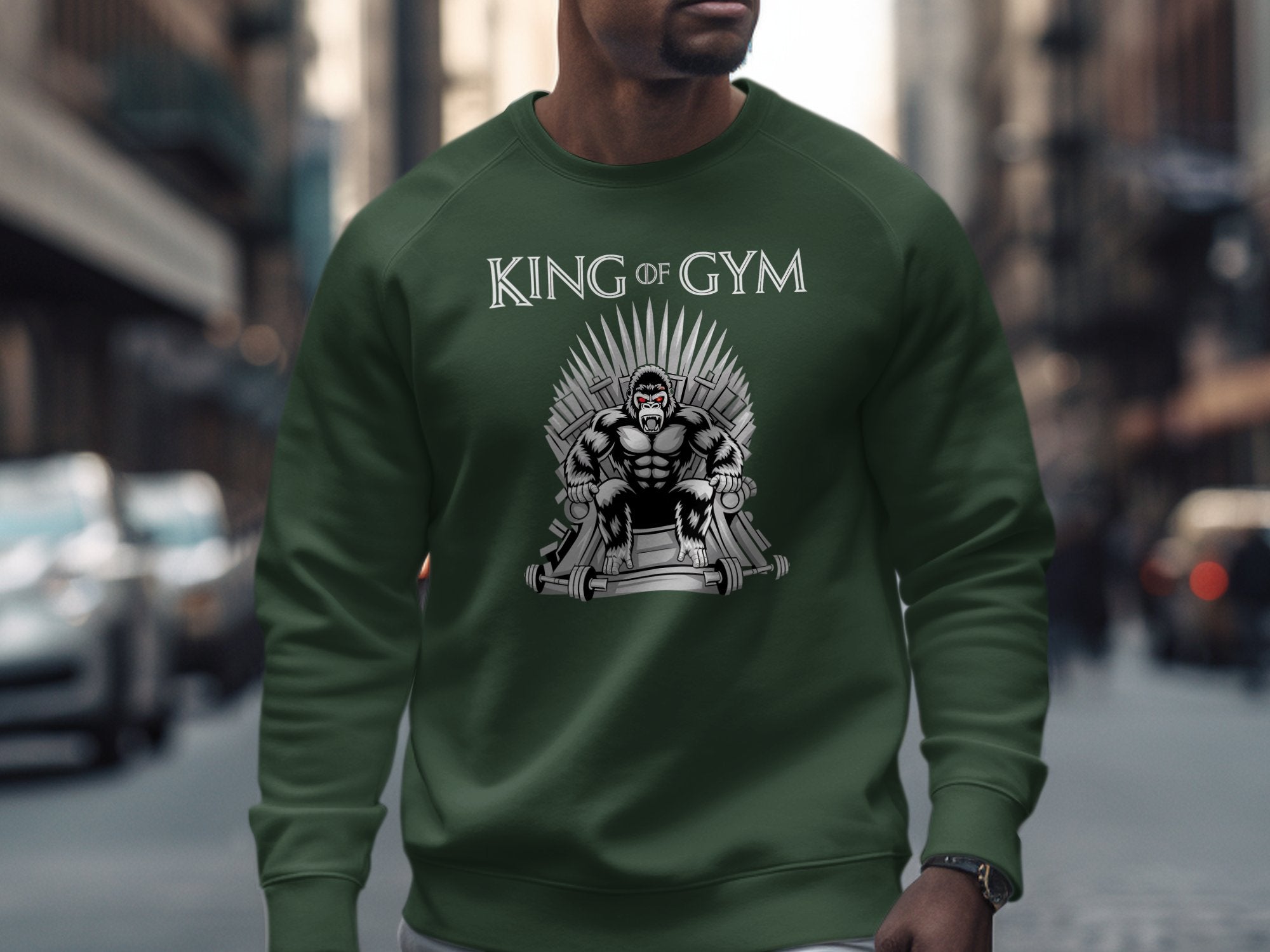 Green sweatshirt with "King of Gym" text and a gorilla sitting on a throne.