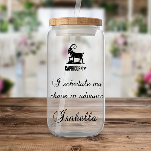 Glass tumbler with Capricorn zodiac symbol and custom name "Isabella".