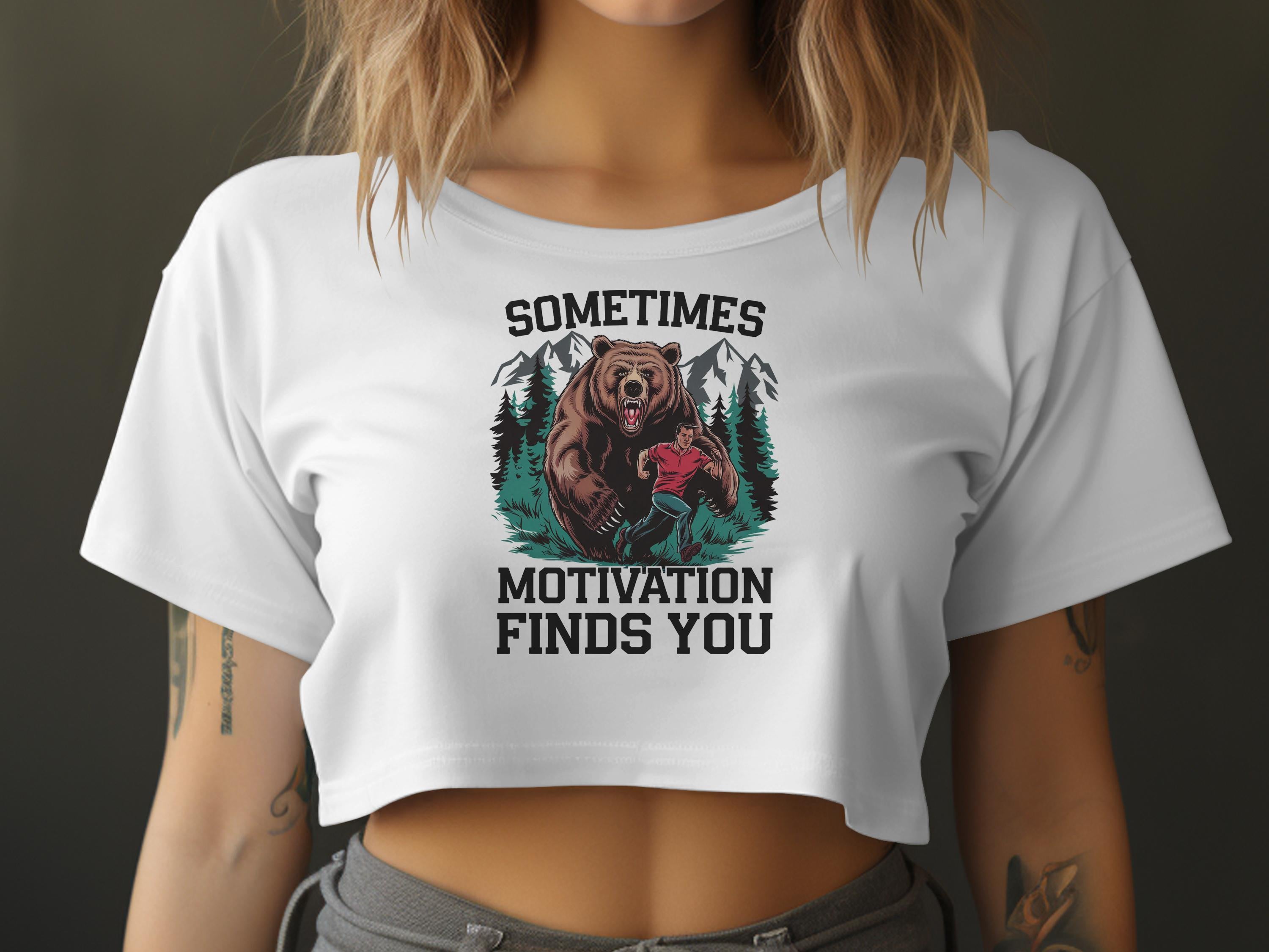 Crop top with bear chasing man and text "Sometimes motivation finds you".