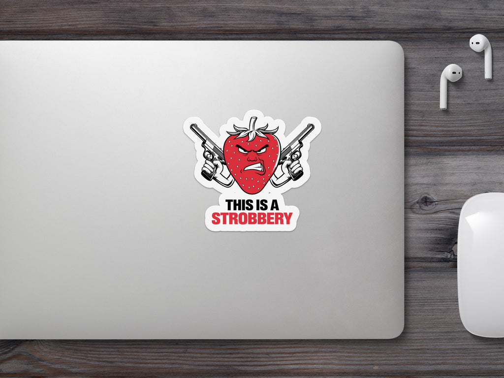 Strawberry with guns and text "THIS IS A STROBBERY".