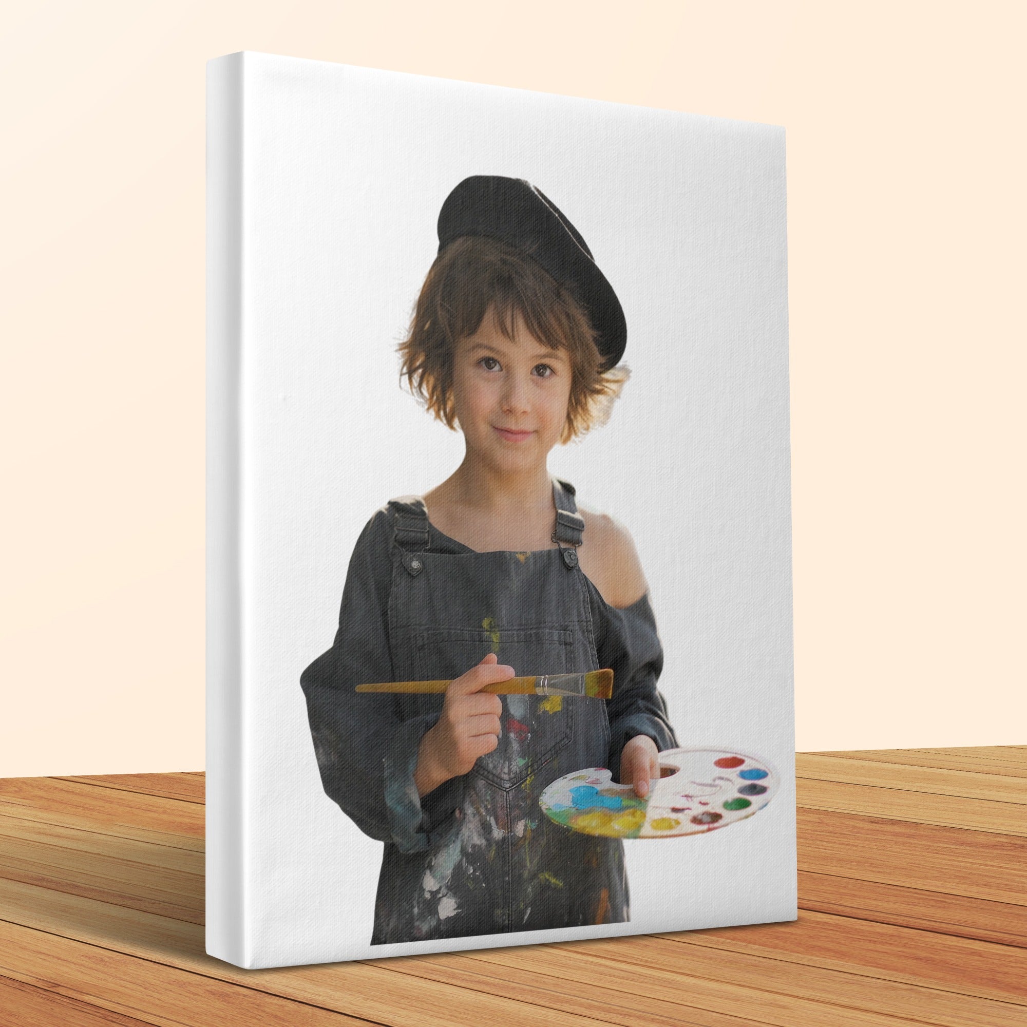 Young artist in overalls and beret holds paintbrush and palette.