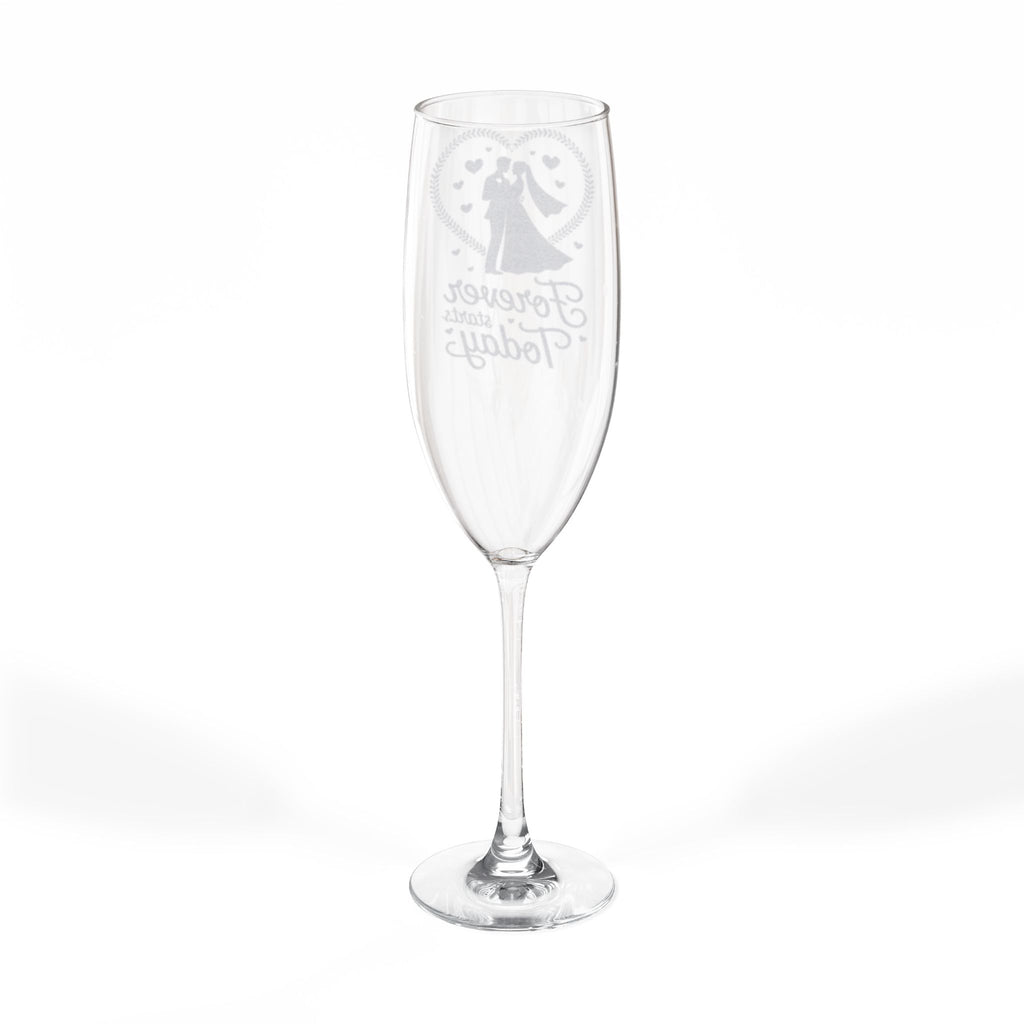Engraved champagne flute with "Forever Yours" and heart-shaped floral design.