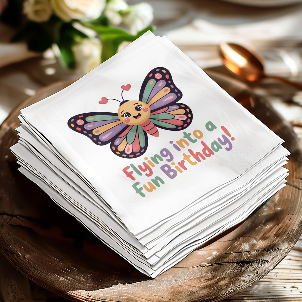 Napkins with a colorful butterfly and "Flying into a fun Birthday!" text.