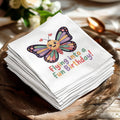 Napkins with a colorful butterfly and "Flying into a fun Birthday!" text.
