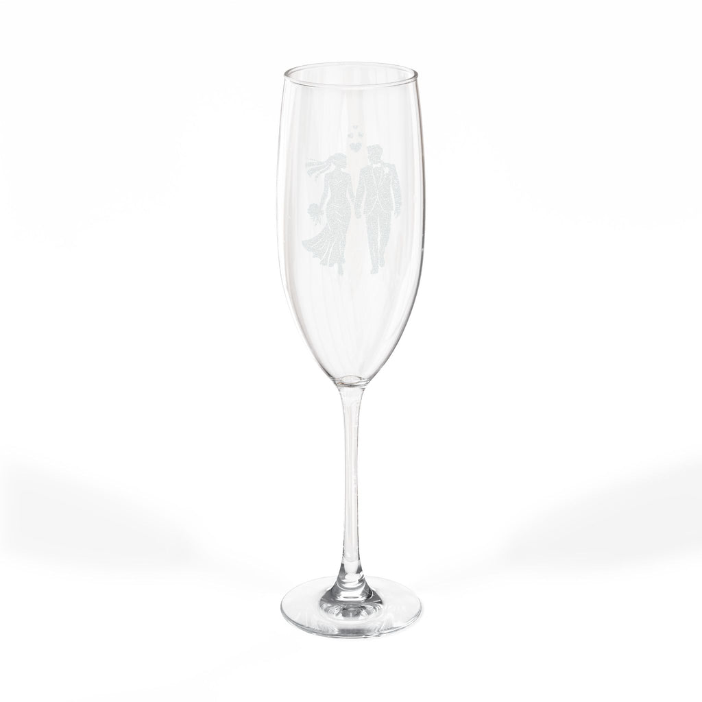 Champagne flute with etched silhouette of a bride and groom.