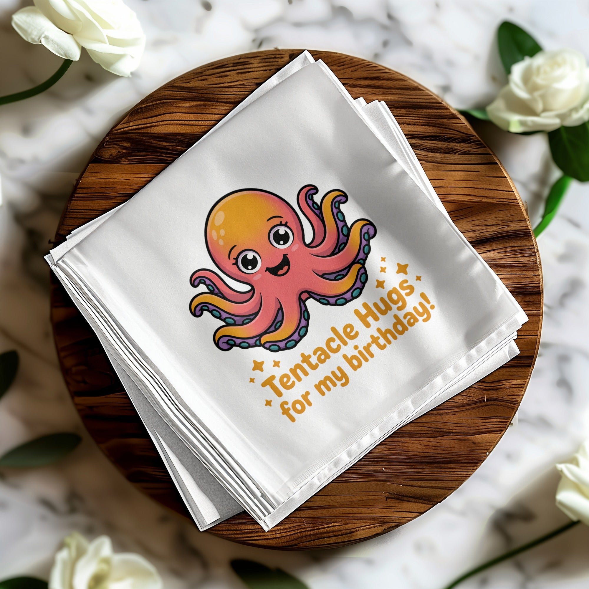 White cloth napkin with a cartoon octopus and text "Tentacle Hugs for my Birthday!".