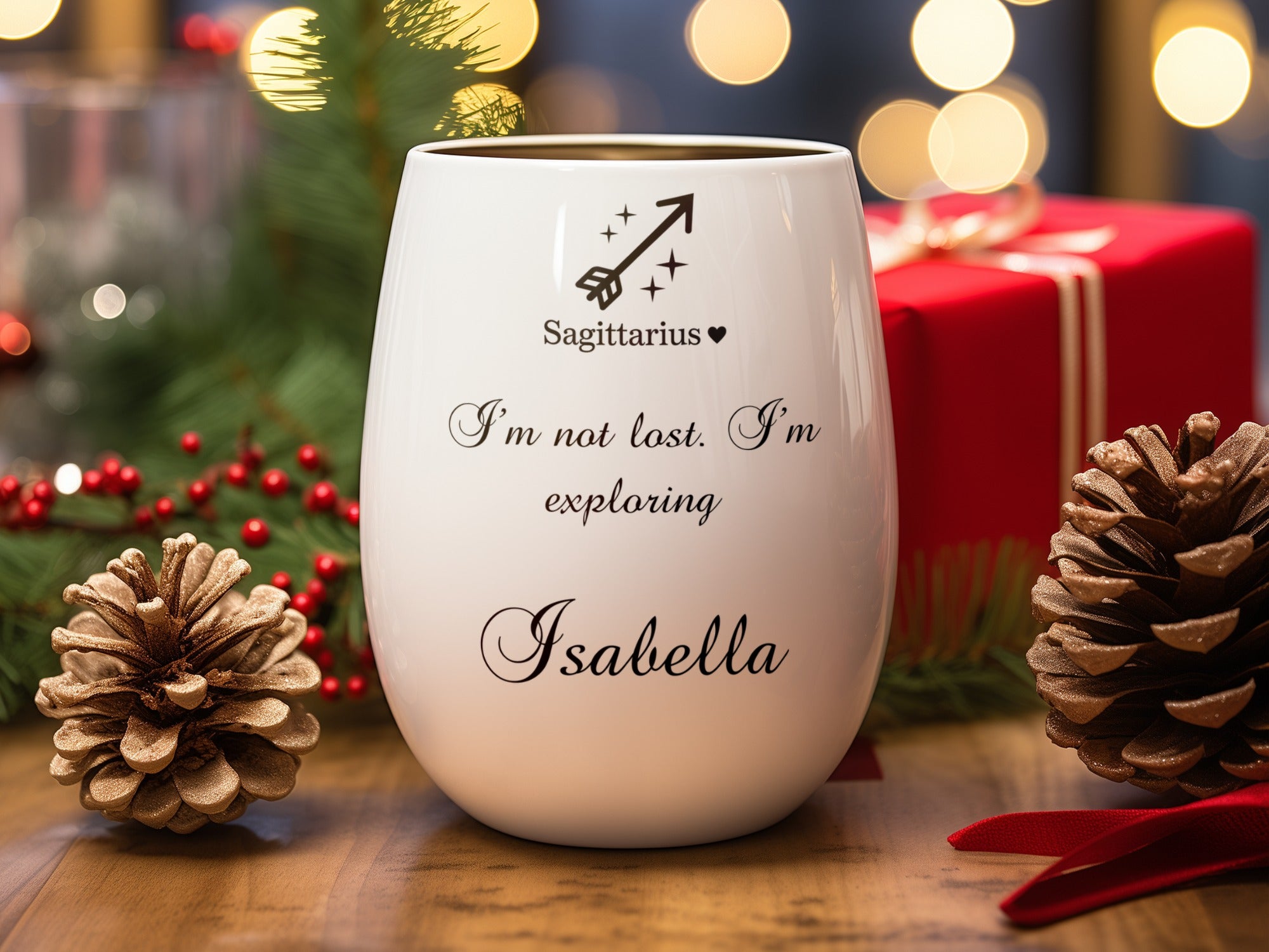 White wine glass with "I'm not lost. I'm exploring" and "Isabella" text.