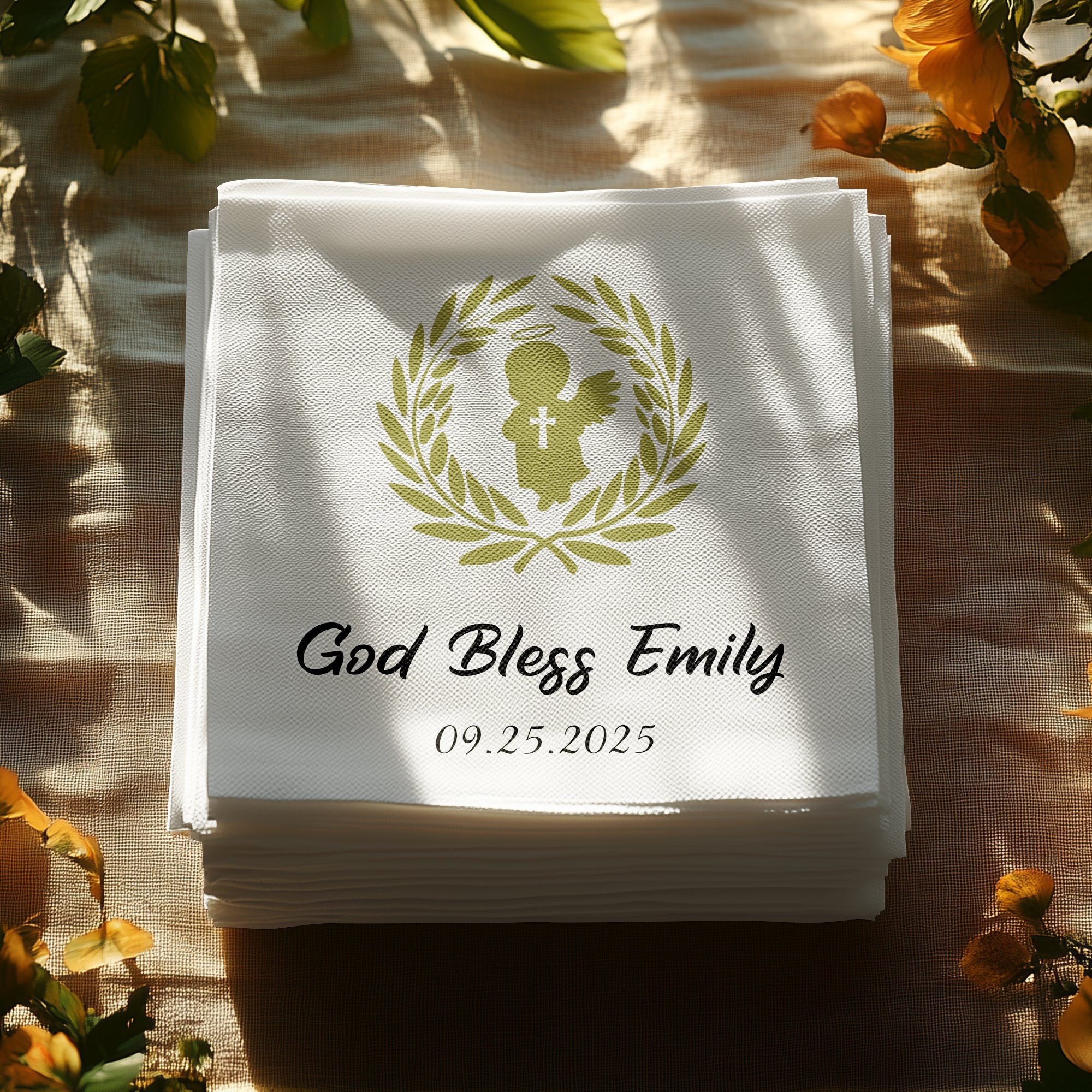 Stack of white personalized napkins with "God Bless Emily" and a date.