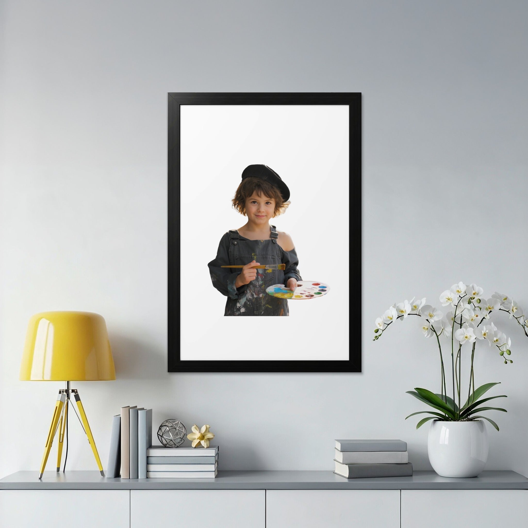 Young artist in beret holding palette and paintbrush, black frame.