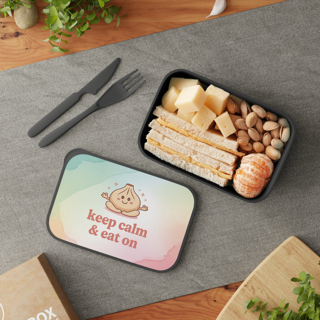 Lunchbox with sandwich, cheese, pistachios, and tangerines.