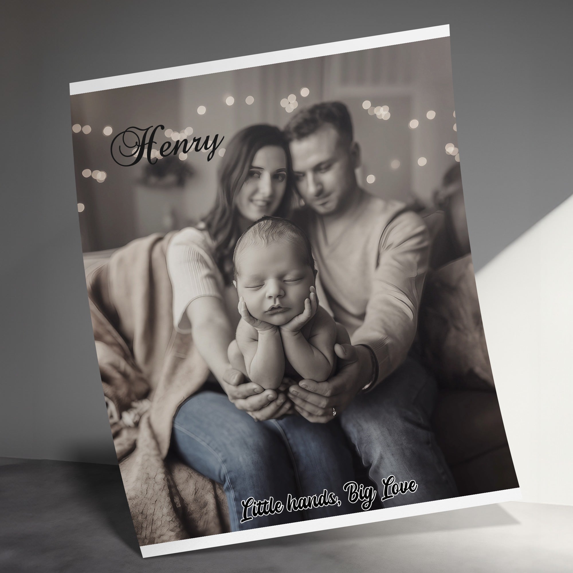 New parents hold sleeping baby Henry, with text "Little hands, Big Love".