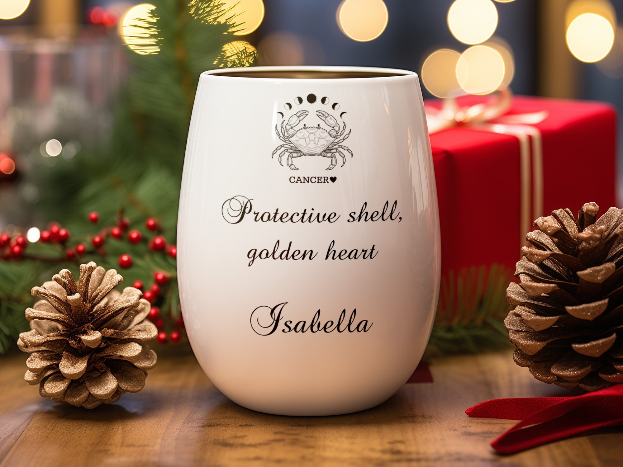 White wine glass with "Cancer" crab zodiac, "Protective shell, golden heart," and "Isabella" text.