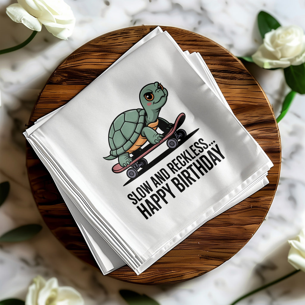 Towel with cartoon turtle on skateboard, text "SLOW AND RECKLESS... HAPPY BIRTHDAY".