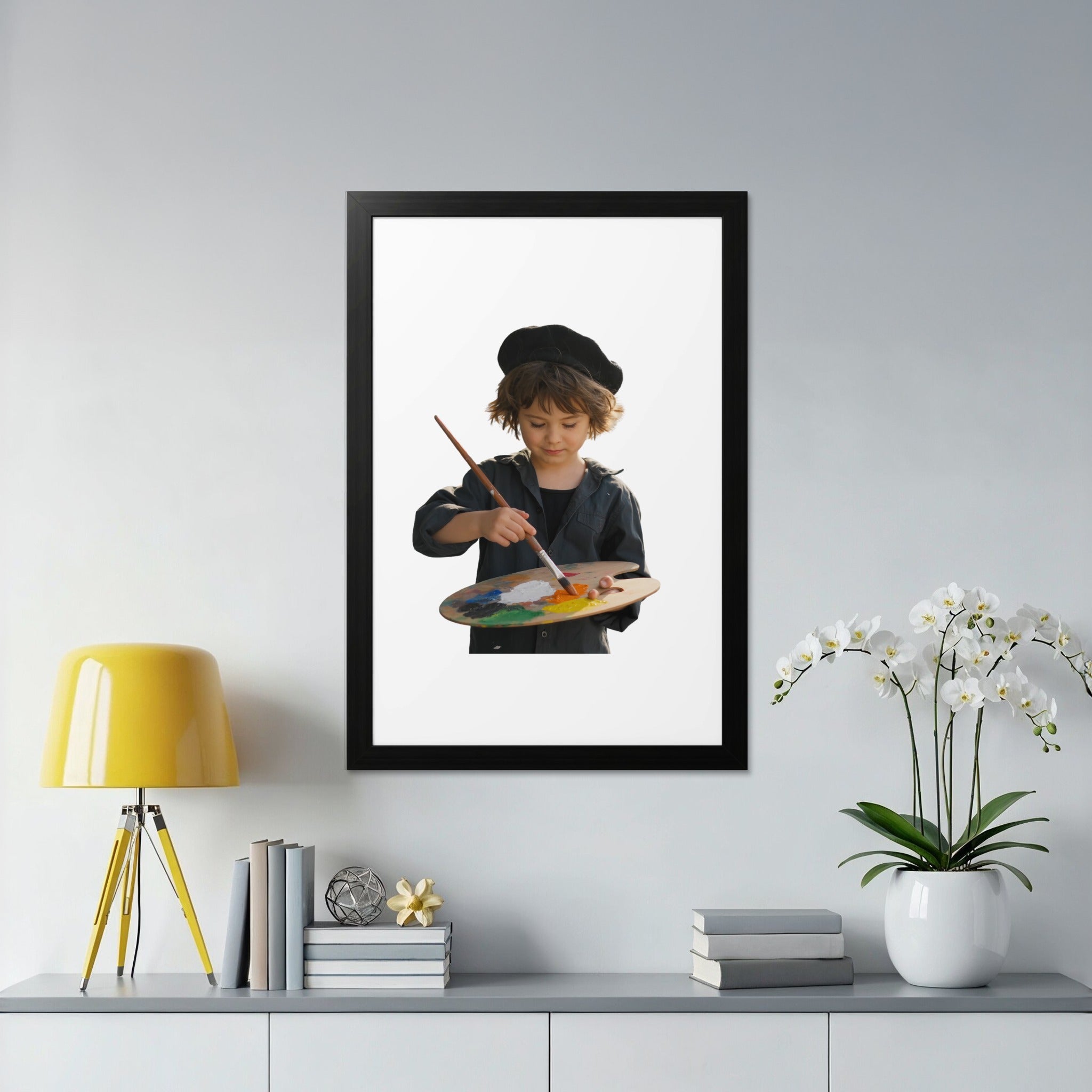 Young artist in beret paints on palette, framed in black.