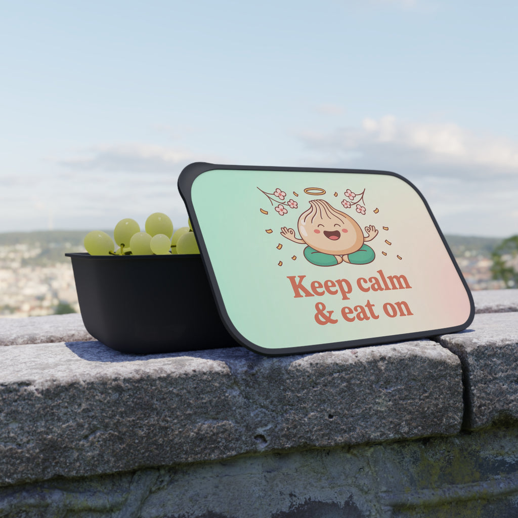 Black lunchbox with a cute dumpling character and "Keep calm & eat on" text.
