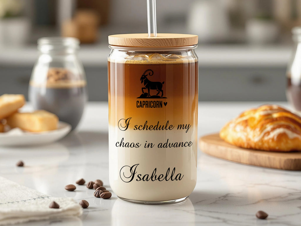 Capricorn mug with coffee, straw, and text "I schedule my chaos in advance Isabella."