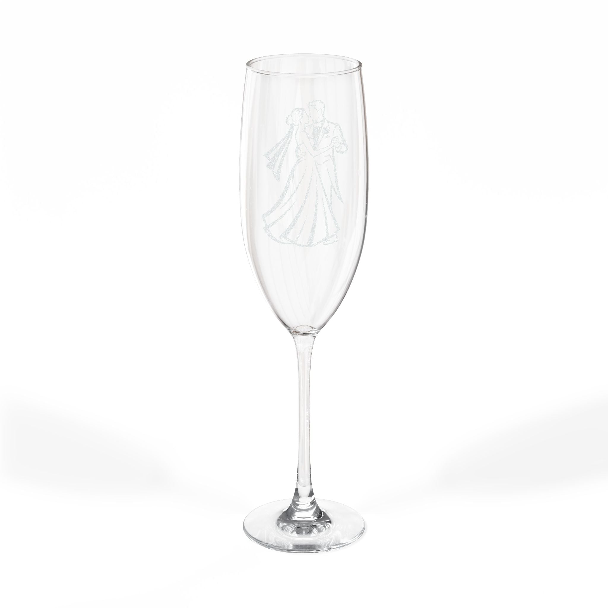 Clear champagne flute with etched bride and groom dancing.