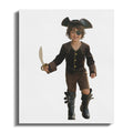 Young child in a pirate costume holding a toy sword and wearing an eyepatch.