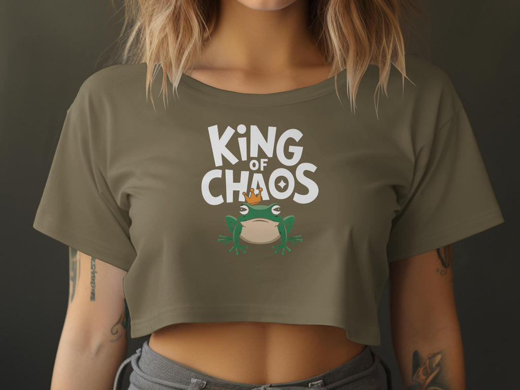 Cropped olive t-shirt with "King of Chaos" text and a crowned frog graphic.