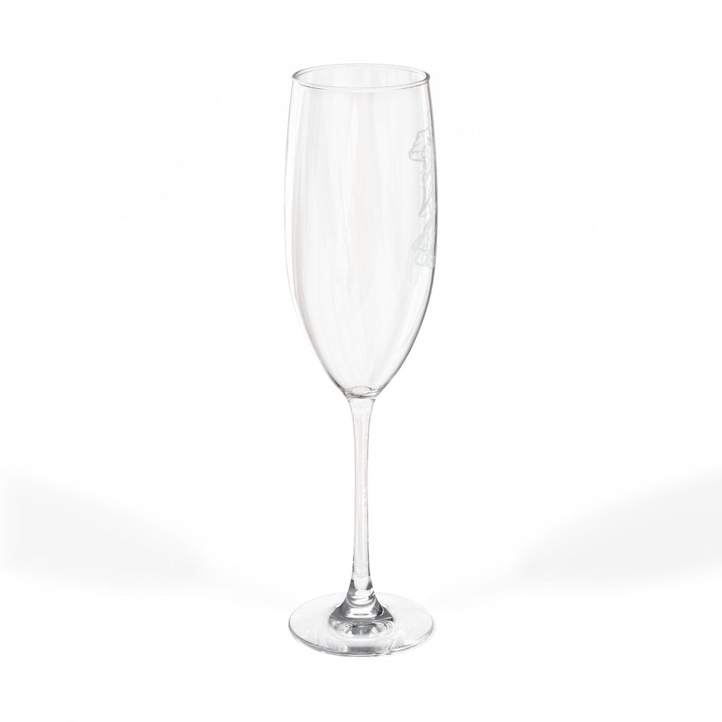 Clear champagne flute with delicate etched floral design on bowl.
