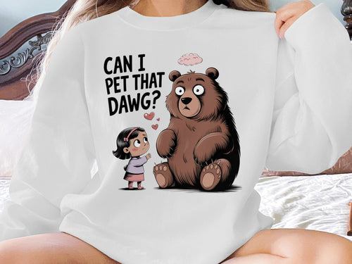 Woman in sweatshirt featuring a bear and girl asking "Can I pet that dawg?"