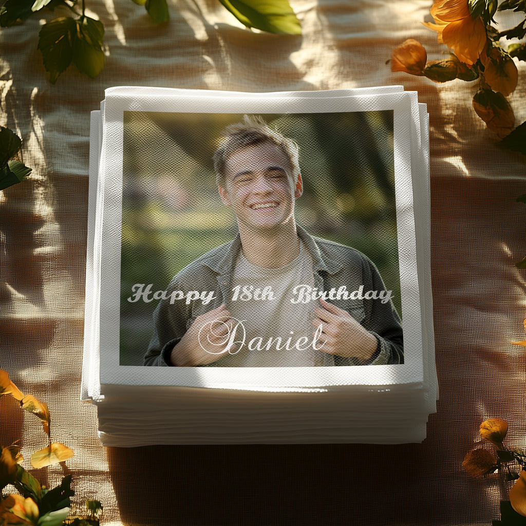 Stack of napkins with "Happy 18th Birthday Daniel" printed on the top one.