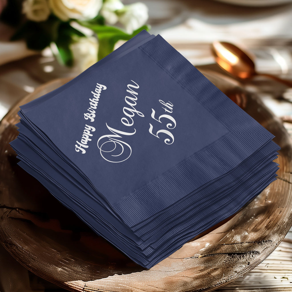 Navy blue napkins with "Happy Birthday Megan 55th" text.