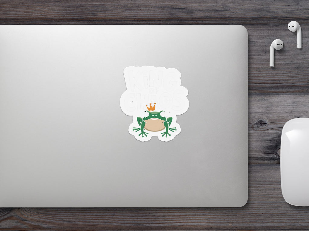 Frog sticker on a laptop reading "King of the Chaos".