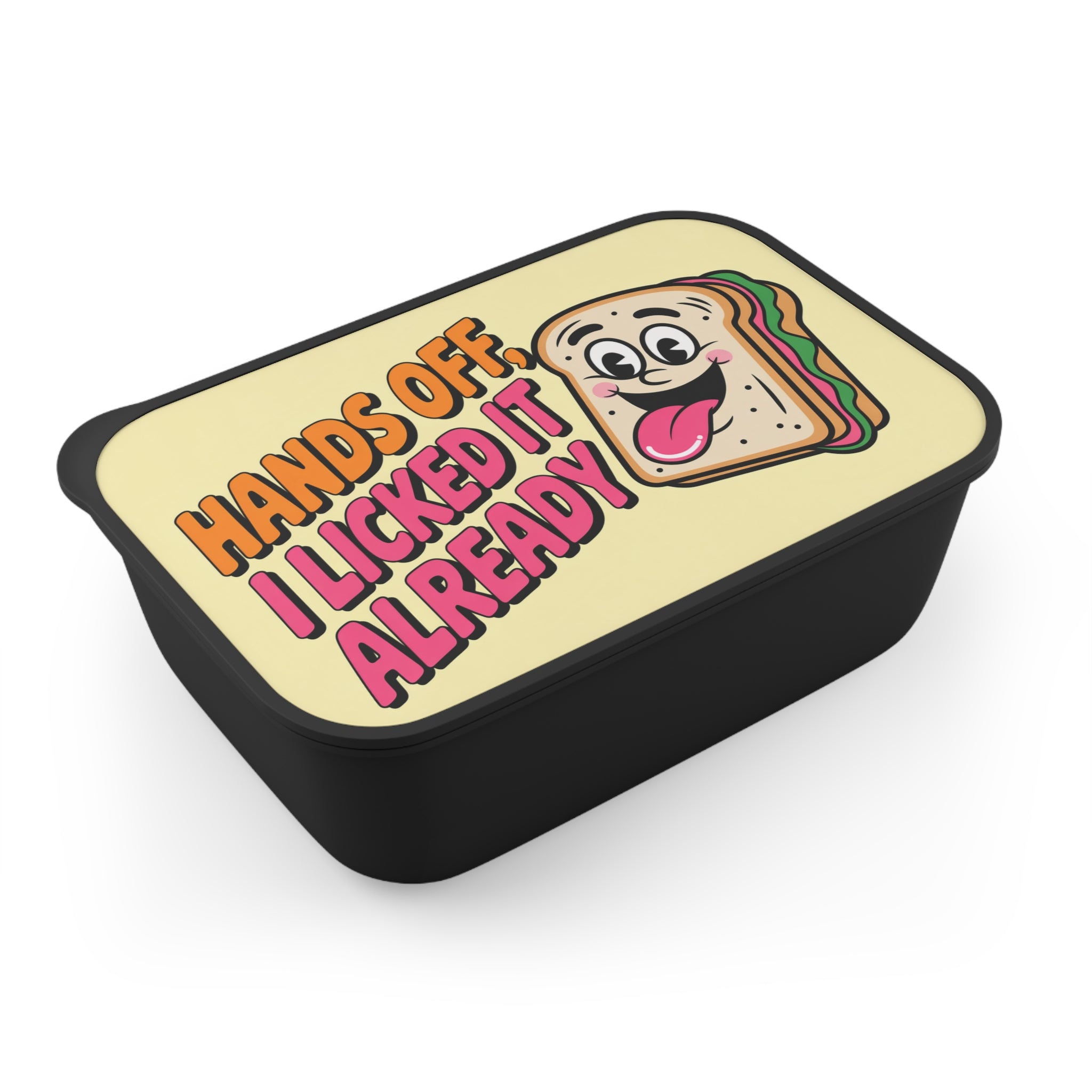 Black lunchbox with cartoon sandwich and text "Hands off, I licked it already".