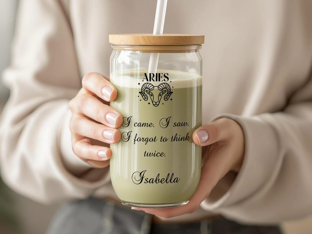 Glass tumbler with "ARIES I came. I saw. I forgot to think twice. Isabella" and ram graphic.