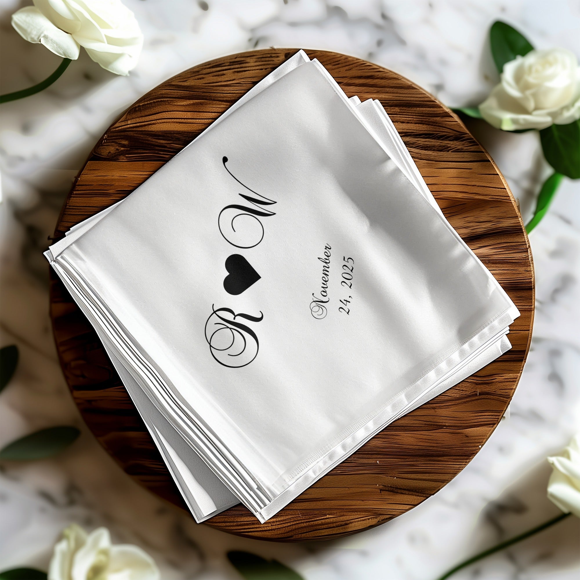 White pocket square with "R & W" monogram, a heart, and "November 24, 2025" text.