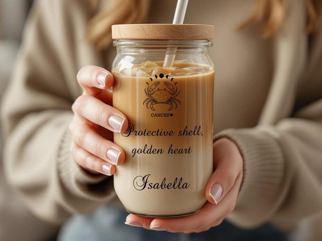Glass tumbler with wooden lid and straw, featuring a Cancer zodiac symbol and personalized text.