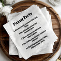 Napkins with "Funny Facts" about a dad, like his jokes and eating habits.