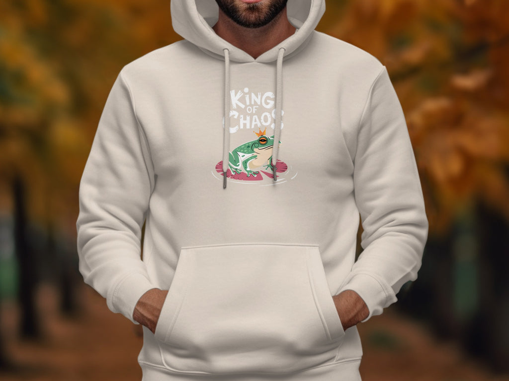 Cream hoodie with "King of Chaos" text and a frog wearing a crown.