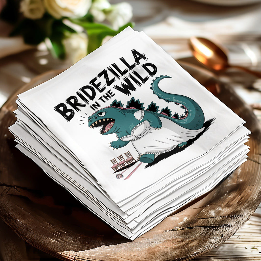 Bridezilla in the Wild text on stack of white napkins with Godzilla in wedding dress.