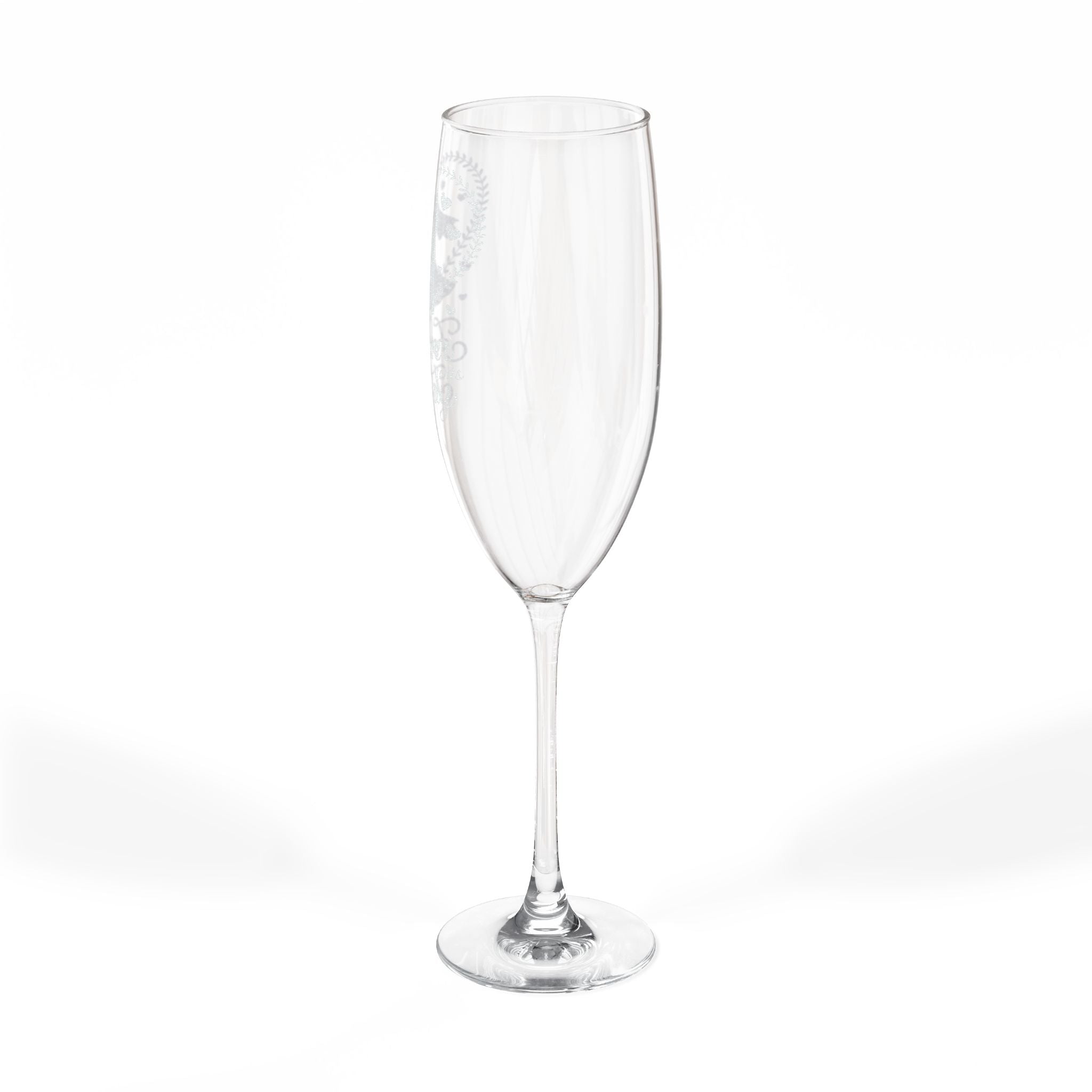 Clear champagne flute with etched floral design on white background.