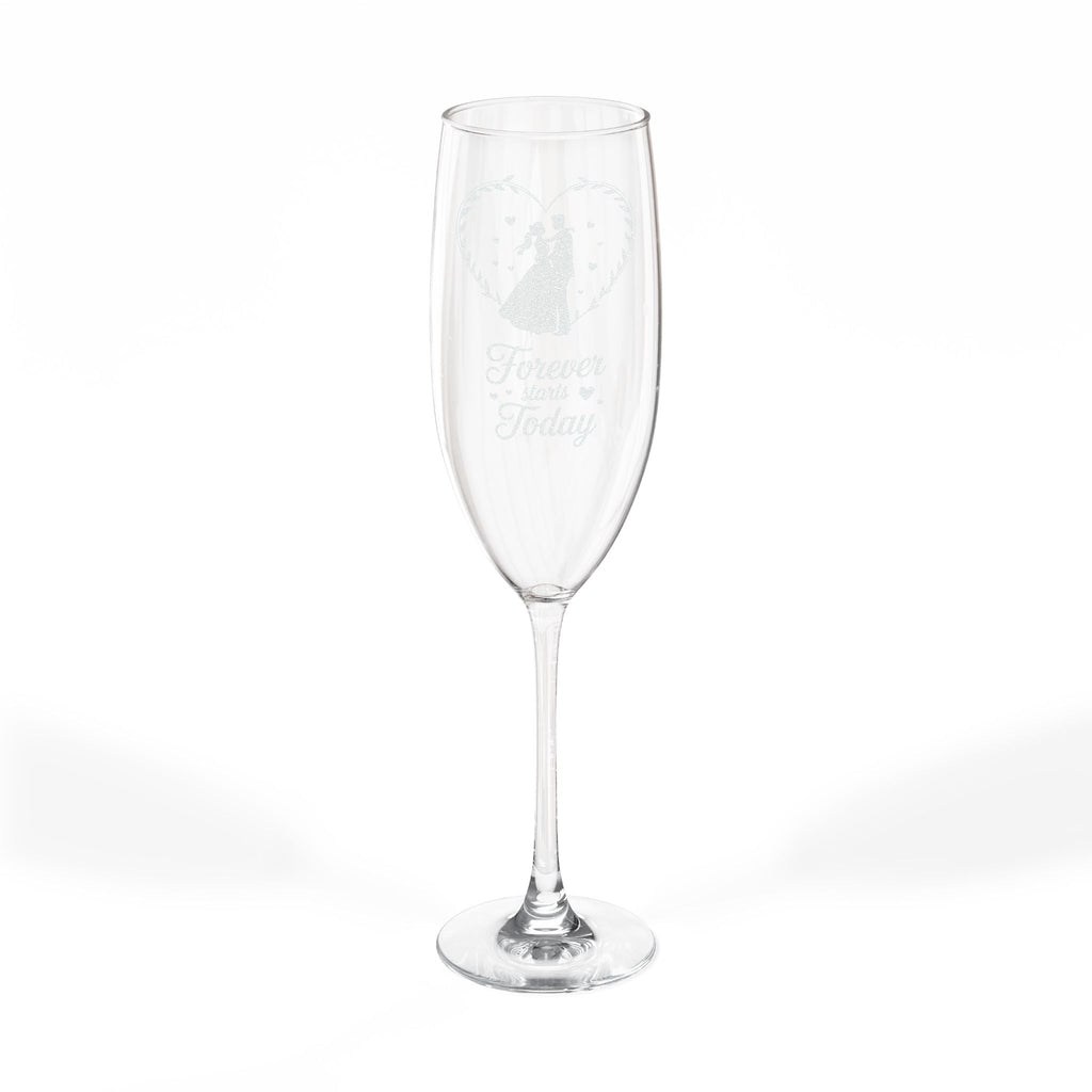 Champagne flute with "Forever starts Today" text and engraved wedding rings.