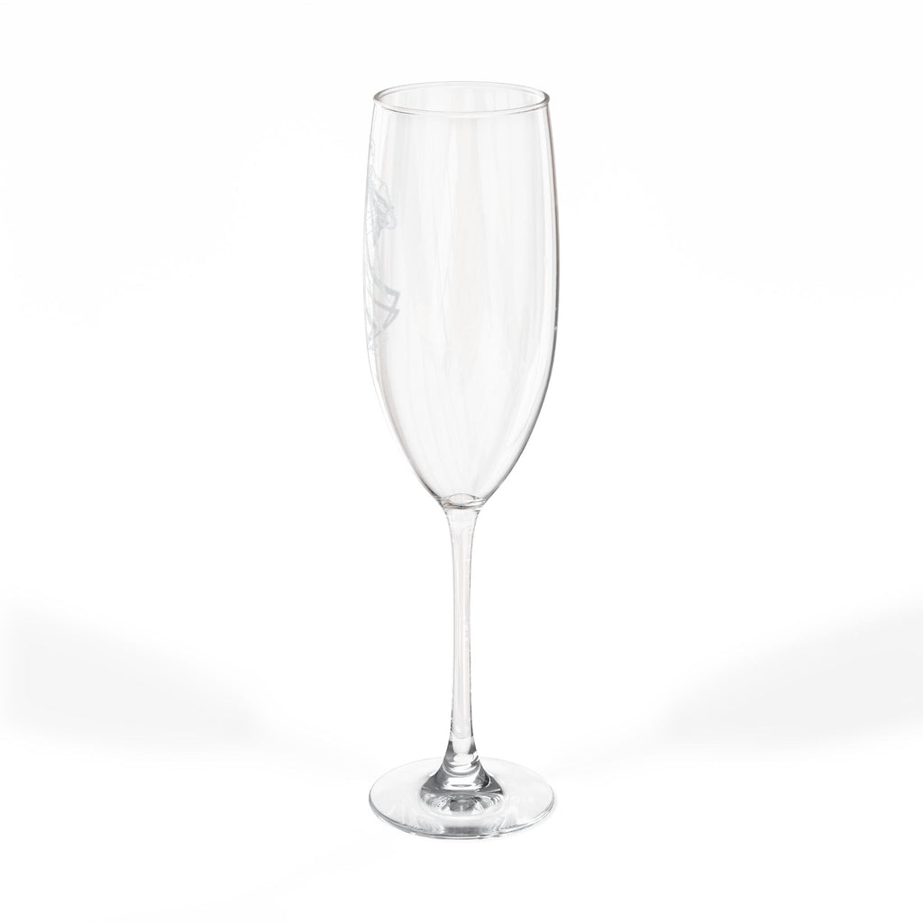 Clear champagne flute with a decorative etched logo on the bowl.