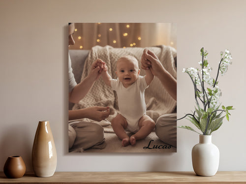 Baby sitting with hands held by two adults, name "Lucas" visible.
