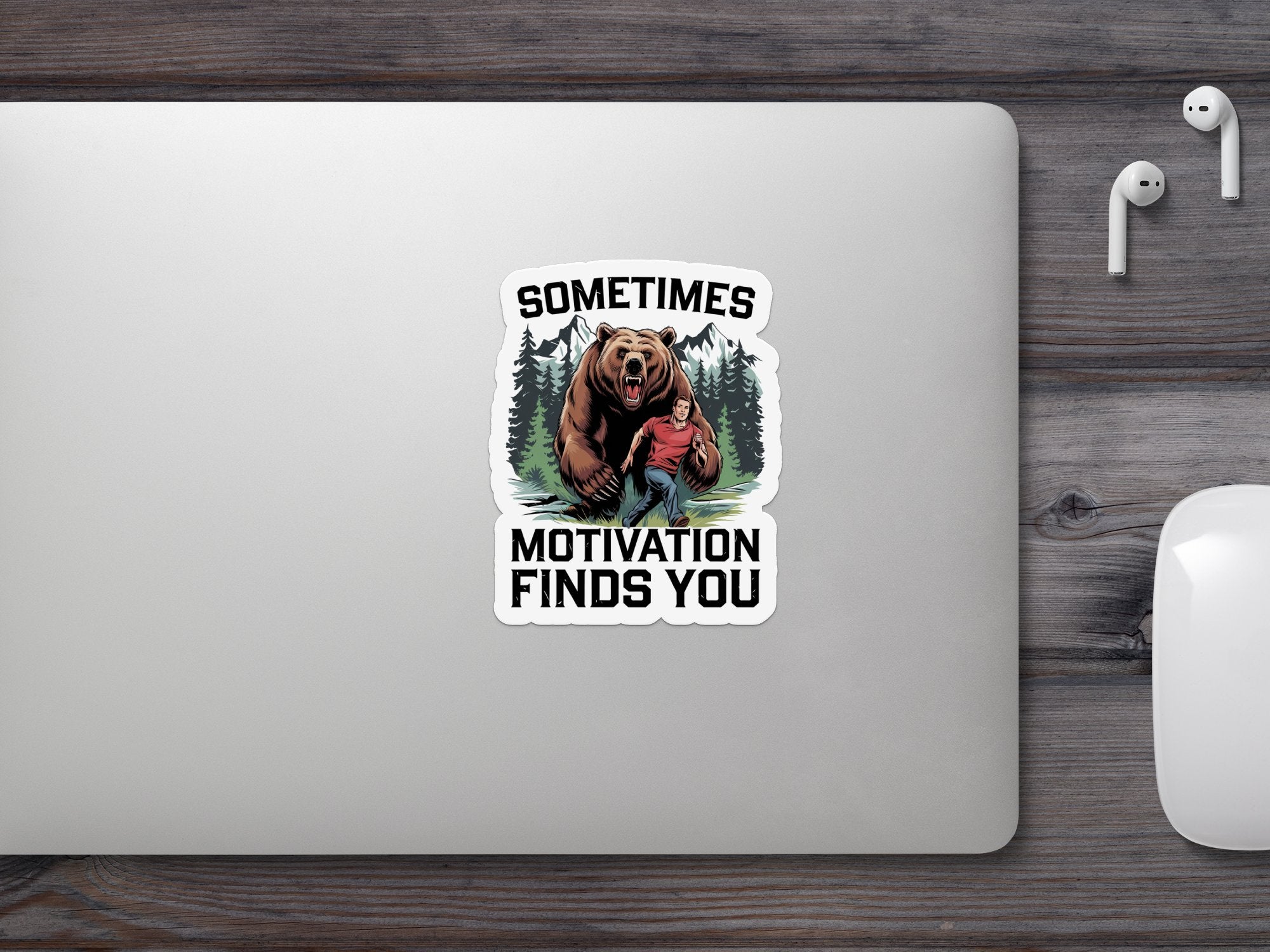Sticker of a man running from a bear with text "Sometimes Motivation Finds You".
