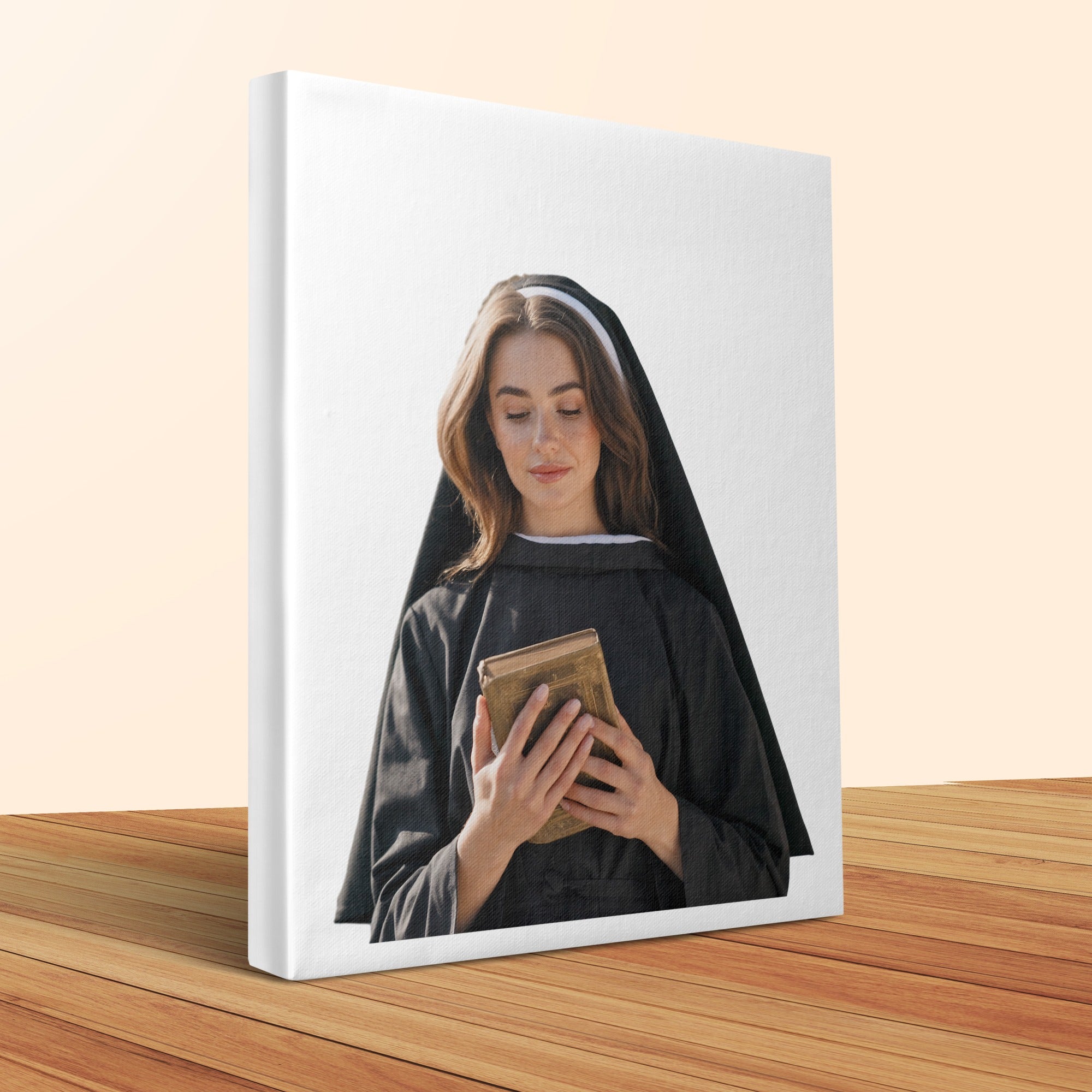 Young woman in nun's habit holds a book.
