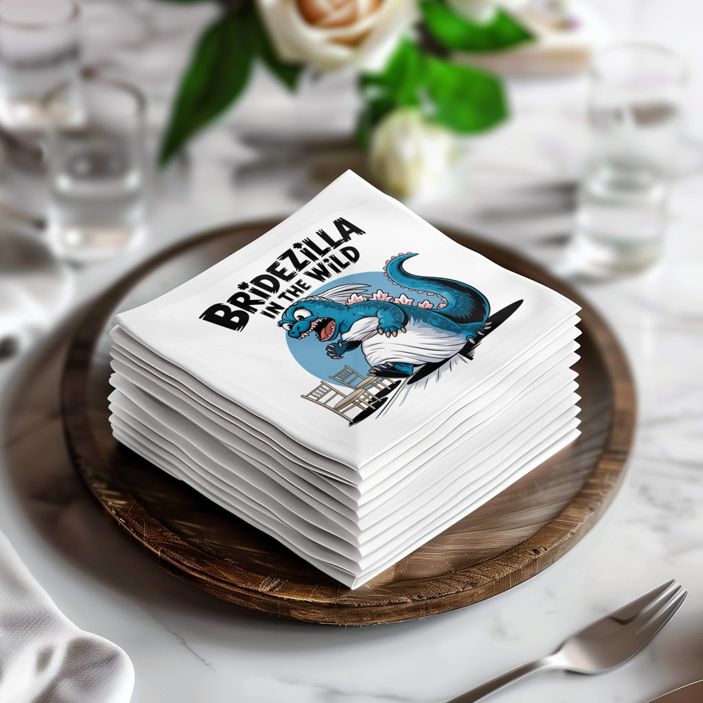 Bridezilla napkin with blue dinosaur and wedding arch illustration.