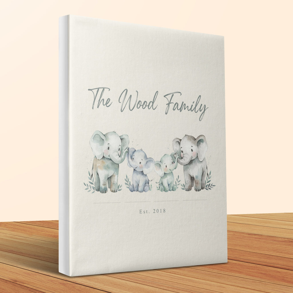 Album with "The Wood Family Est. 2018" in script and watercolor elephants.