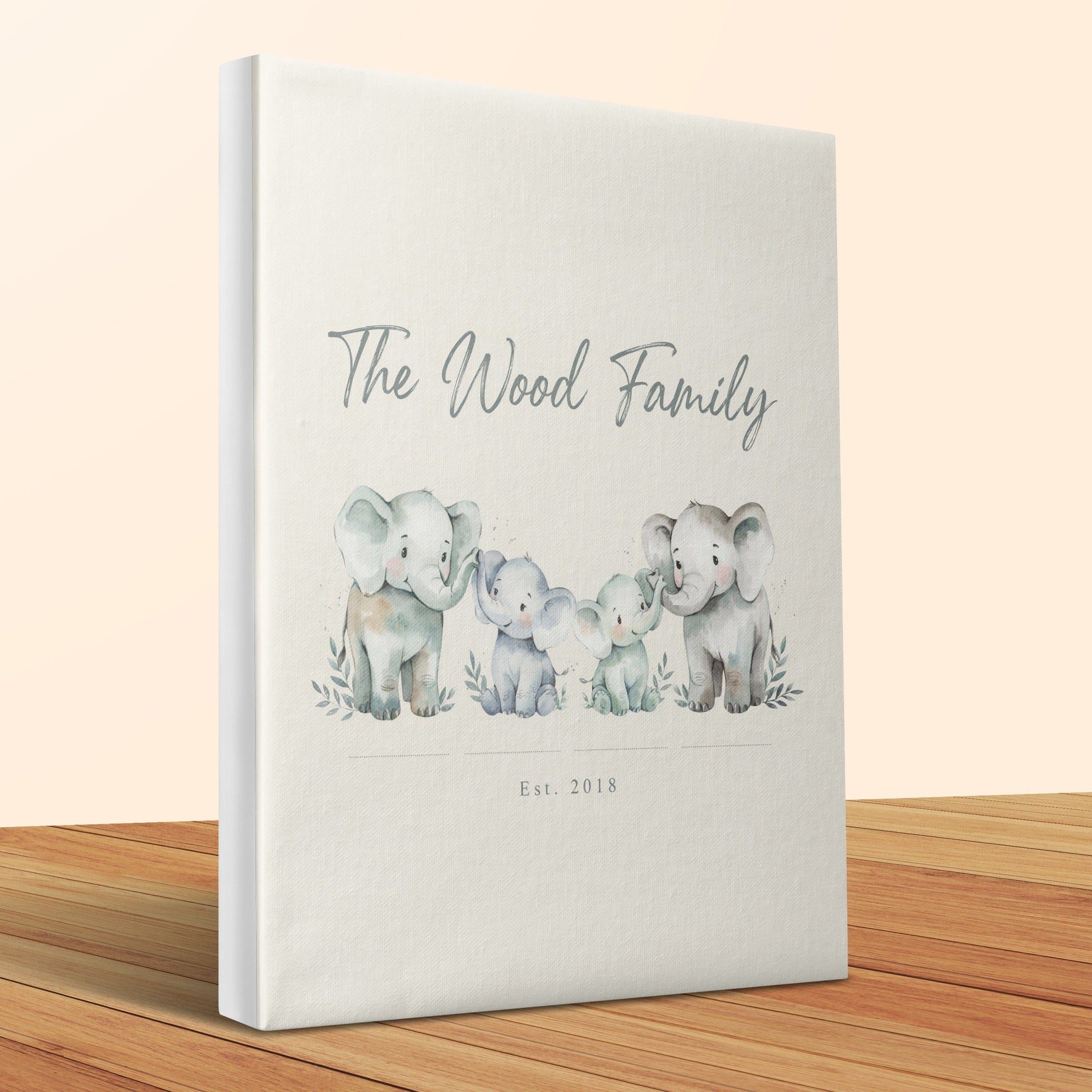 Album with "The Wood Family Est. 2018" in script and watercolor elephants.
